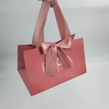 Гореща разпродажба 2023 г., опаковане на бижута, крафт хартиена торба за пазаруване с ленточными дръжки, подаръчни пакети от розов картон с лого от златно фолио
